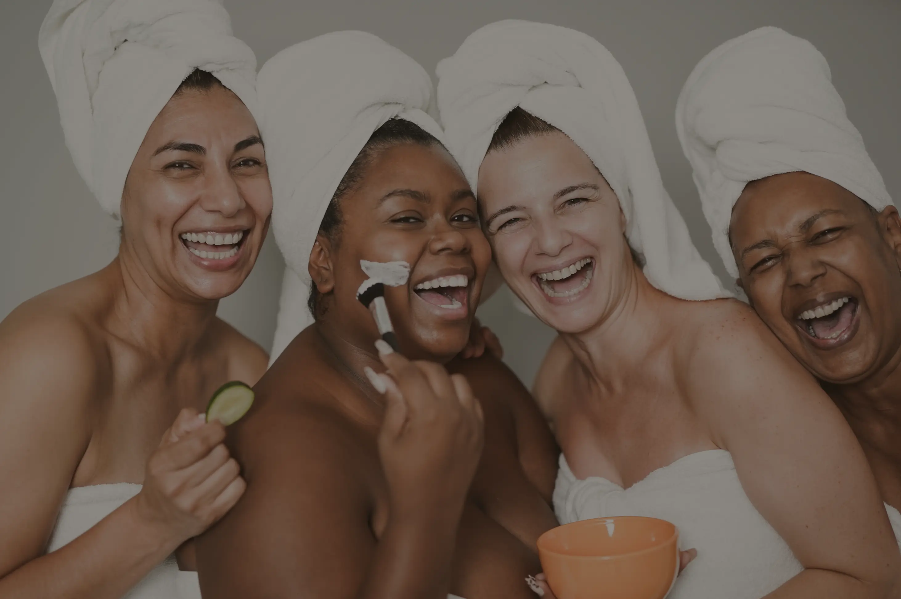 Multiracial women enjoying a spa day together at Pause Spa