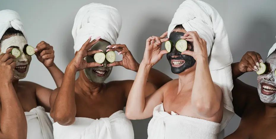 TheraNaka skincare products on a wooden table at Pause Spa